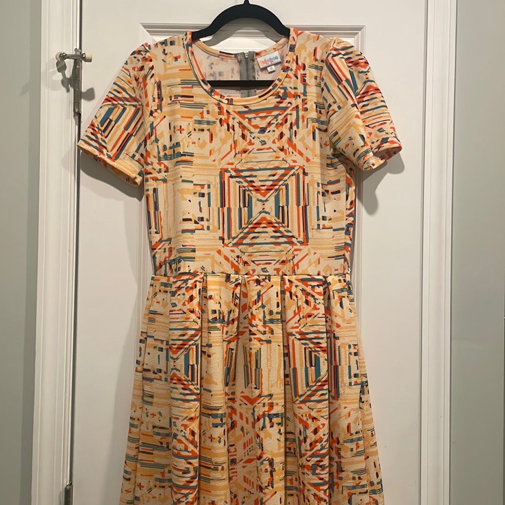 Amelia lularoe. Size med. only worn a couple of times. Great condition.